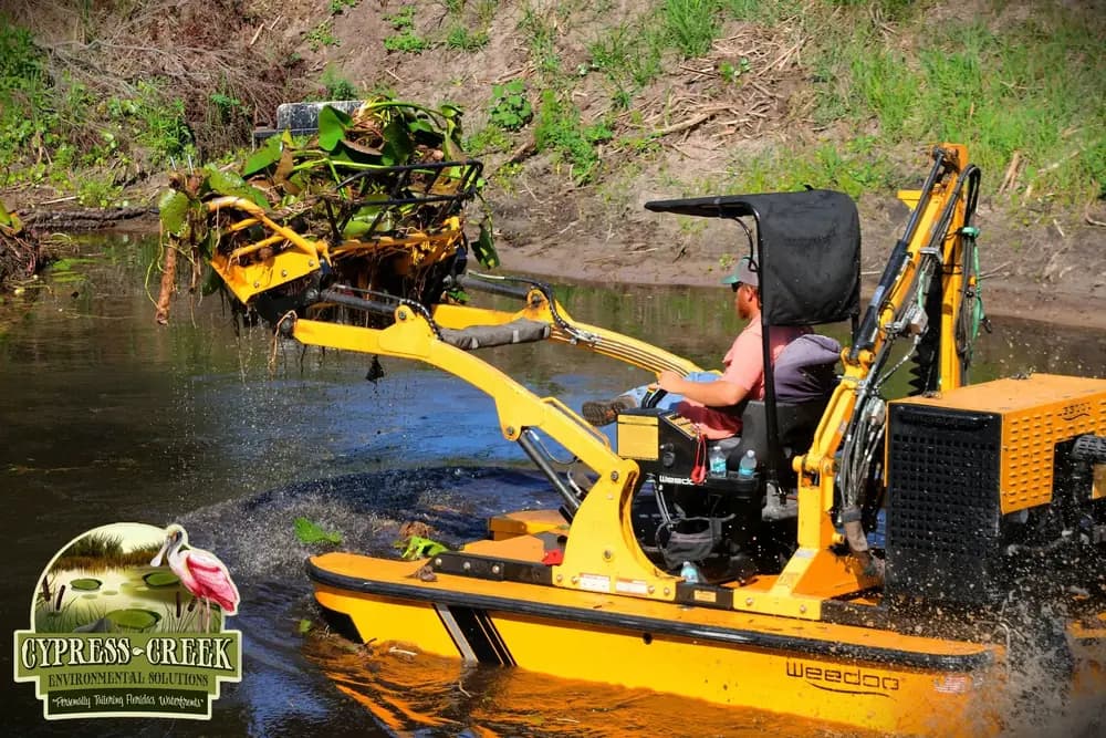 Aquatic debris removal equipment working on a Florida waterway